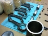 Assembling the pistons, pins and connecting rods