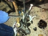 Using a long breaker bar, a puller and my 1/2 drive ratchet to get the tri-axe off the axle