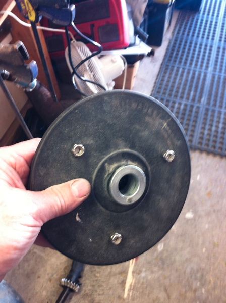 I attach it to the rubber backing plate for my Milwaukee body grinder, spinning very fast!