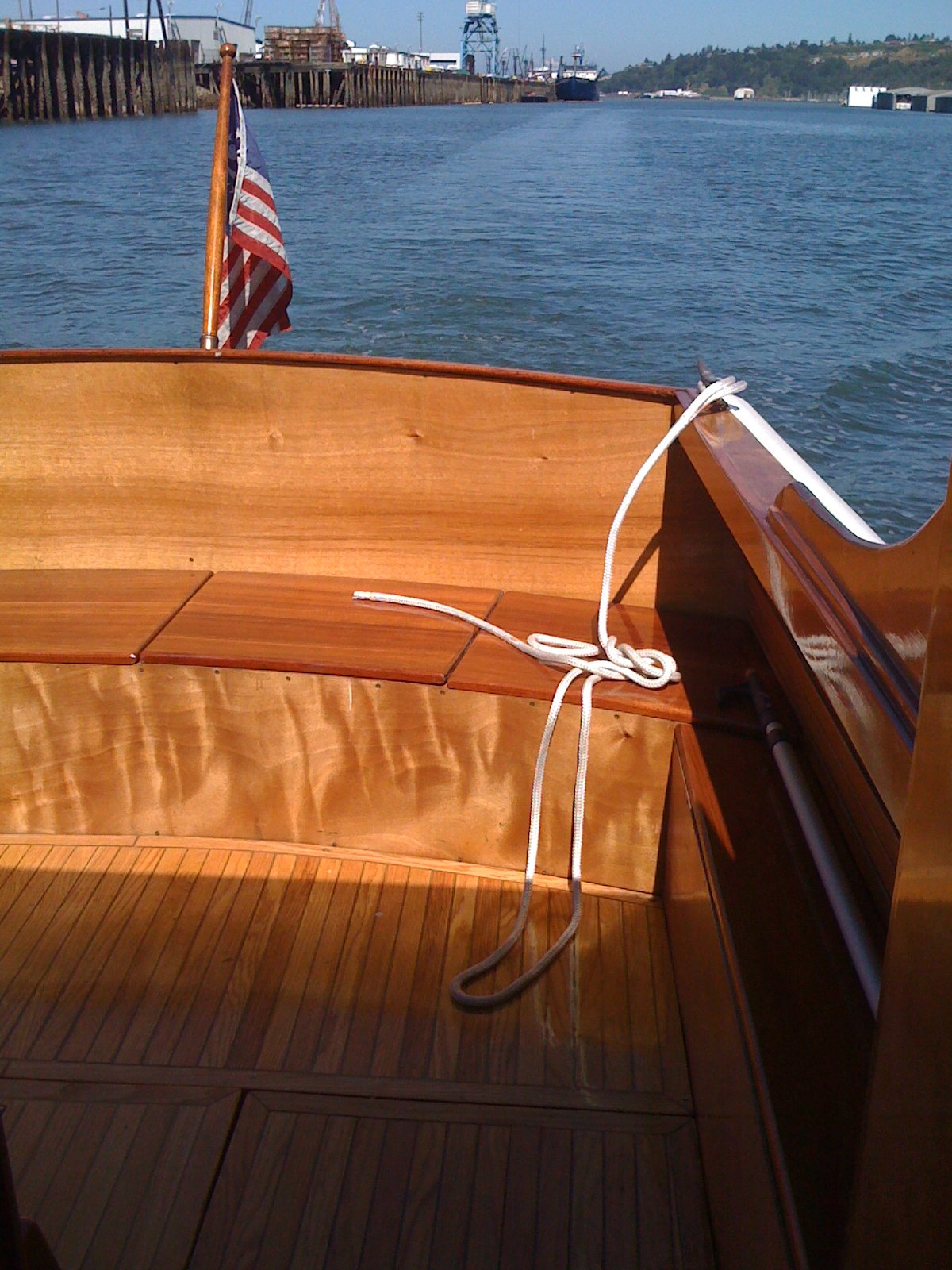 All new mahogany from the gunwales up. Hull is bronze-fastened (refastened 2011) Port Orford Cedar.